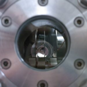 Photograph through the window of a vacuum chamber